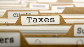Taxes Concept. Word on Folder Register of Card Index. Selective Focus.