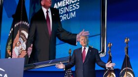President Donald Trump arrives to speak to the America Business Forum Miami, at the Kaseya Center, Wednesday, Nov. 5, 2025, in Miami. (AP Photo/Jacquelyn Martin)