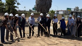 Community members, organizers, and local leaders hold shovels to mark the groundbreaking of Davu Village in Fresno on the morning of Wednesday, June 24, 2026.