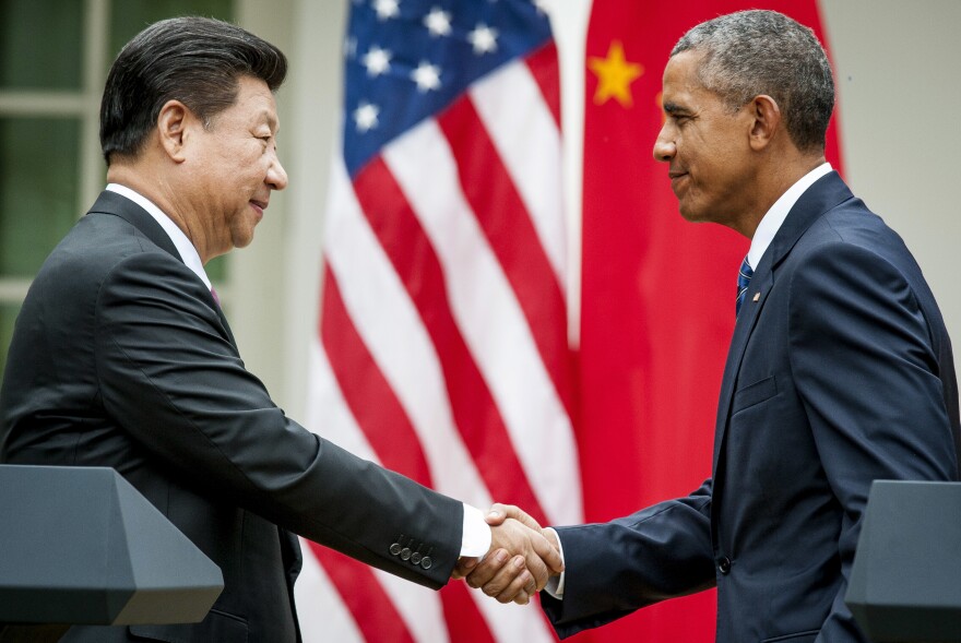Chinese President Xi Jinping shakes hands with then-U.S. President Barack Obama following a news conference in Washington, D.C., on Sept. 25, 2015. During the visit, the two leaders announced an agreement to halt cyberattacks.