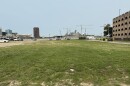 The vacant lot is used for additional parking.