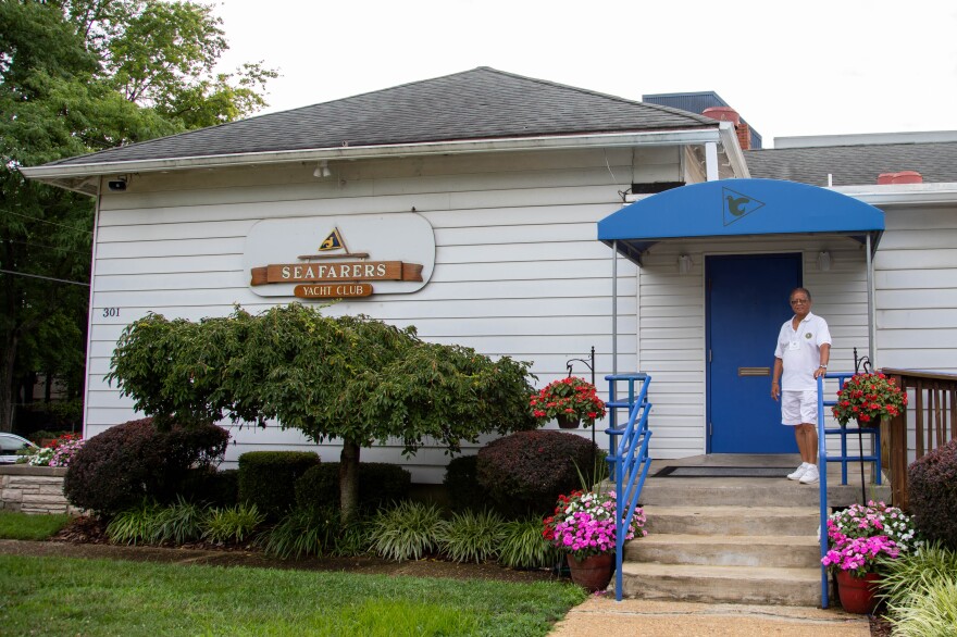 Commodore Benny McCottry stands outside the entrance of the Seafarers Yacht Club of Annapolis in Annapolis, Md. It was founded more than 60 years ago by a handful of Black boaters.