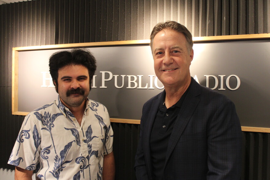 HPR's Jacob Aloi, left, with University of Nevada professor Bo Bernhard, right, on Oct. 22, 2026.