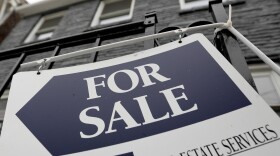 FILE - A sign is displayed outside a house for sale in Pittsburgh, Jan. 4, 2019. The Biden administration is looking to expand reporting requirements on all-cash real estate deals to help crack down on bad actors' use of the U.S. market to launder money made through illicit activity. (AP Photo/Keith Srakocic, File)