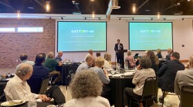 Paul Malliband, executive director of Battery-NY, addresses the crowd at a Binghamton University forum about the new battery development facility.