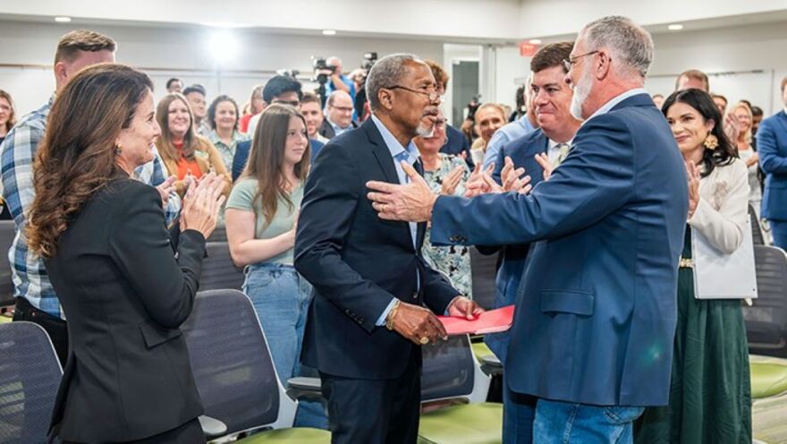 Sen. Darryl Rouson is applauded at the USF Health Morsani College of Medicine in Tampa on June 25, 2025, after learning a substance abuse and mental health research center on campus will be named after him. The center will be part of the Louis de la Parte Florida Mental Health Institute.