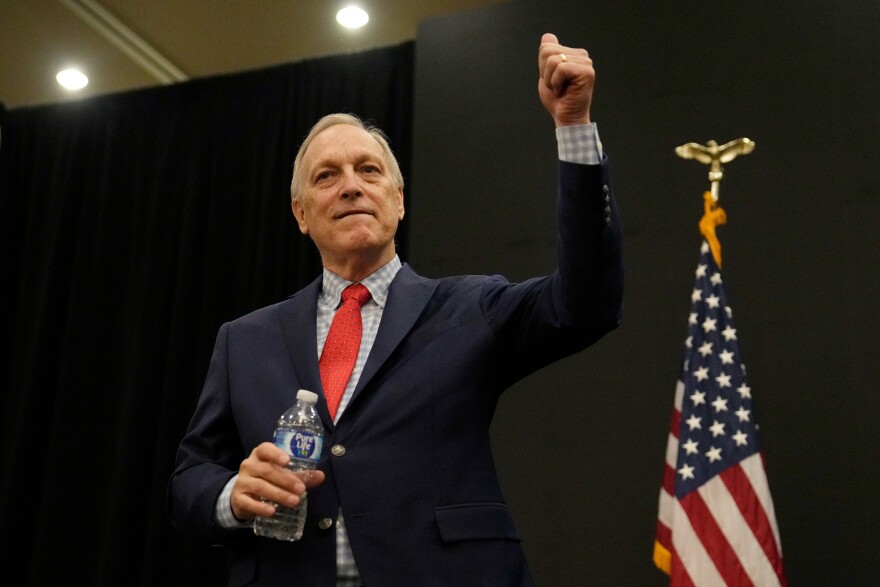 Rep. Andy Biggs, R-Ariz., who is running in the primary for Arizona governor, gives a thumbs up to supporters at a campaign event, Friday, July 17, 2026, in Gilbert, Ariz.