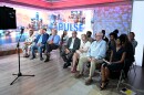 Apple attend a debate between U.S. Senate candidates Abdul El-Sayed and U.S. Rep. Haley Stevens, Monday, July 27, 2026, in Southfield, Mich. (Robin Buckson/Detroit News via AP, Pool)