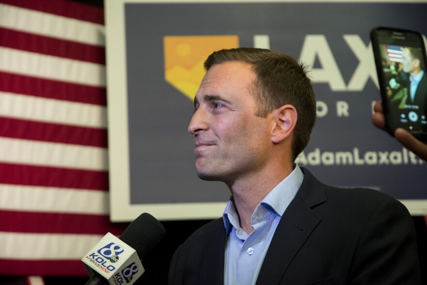 Adam Laxalt speaks to reports at a campaign event in Reno.