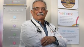 Dr. William Valenti, who has championed HIV care in Rochester for more than 40 years, is retiring from his career at Trillium Health, where he has overseen programs aimed at ending the HIV epidemic. Dr. William Valenti holds his self-published book, A Matter of Urgency, a collection of patient stories and personal reflections that chronicle the HIV epidemic.