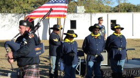 Members of the Bravo Zulu Homefront Buffalo Soldiers Association take part in a re-dedication ceremony at New Trinity Cemetery in Haltom City, November 11, 2025.