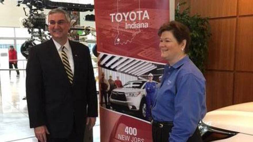 Indiana Gov. Eric Holcomb and TMMI President Millie Marshall were all smiles at Tuesday's announcement.