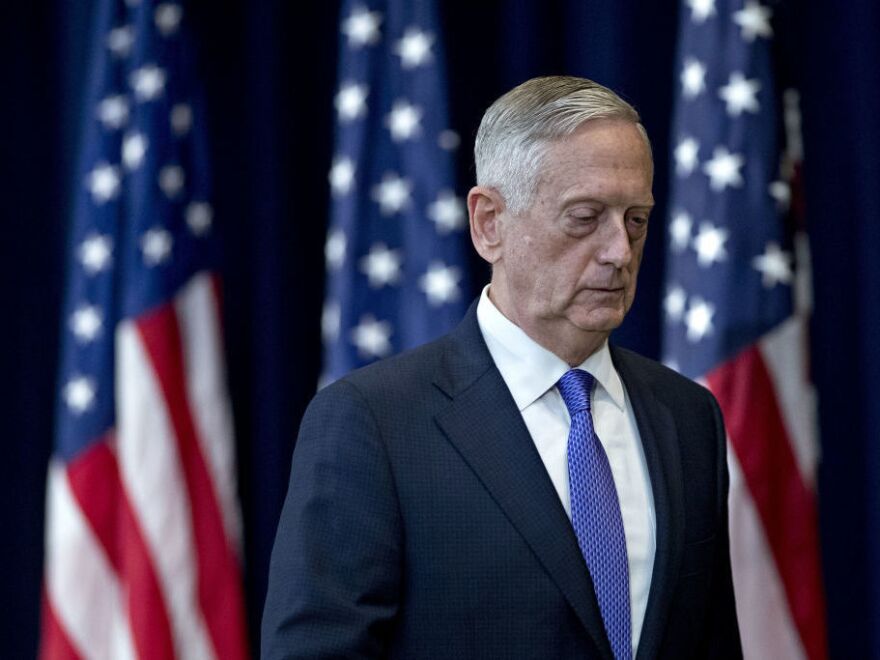 James Mattis, then U.S. secretary of defense, leaves a news conference following a meeting about U.S.-China diplomacy and security at the State Department in Washington, D.C., in June 2017. Mattis' new book, <em>Call Sign Chaos, </em>implies criticism of President Trump without taking direct shots at him.