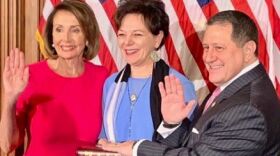Morelle takes the oath of office with House Speaker Nancy Pelosi and his wife Mary Beth standing with him.