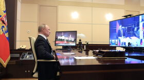 Russian President Vladimir Putin chairs a Security Council meeting via a video link at the Novo-Ogaryovo state residence outside Moscow.
