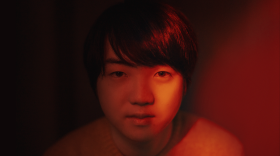 Mao Fujita, in all red.