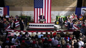 FILE - Former President Donald Trump speaks during a commit to caucus rally, Saturday, Oct. 7, in Waterloo. By the time he returns Monday, Oct. 16, to lowa, Trump will have drawn more than 10,000 people to his events here in less than a month. There's no guarantee his crowds will translate to support in the state's Jan. 15 caucuses that will launch the 2024 nominating cycle. But unlike his campaign in 2016, Trump has a more sophisticated organization to capitalize on his high-wattage events.