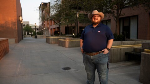 Giles Sims, who is getting a 90-hour bachelor of applied science in communication from Ensign College poses for a portrait on campus in Salt Lake City, Aug. 6, 2026, in Salt Lake City.