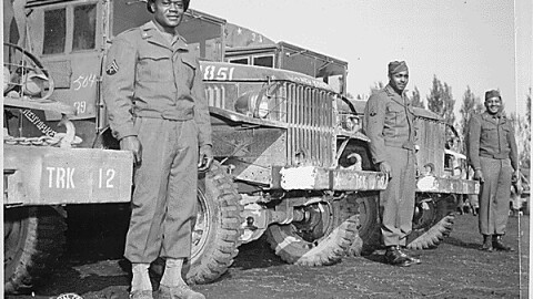 Soldiers in the Red Ball Express. Left to right: T/5 Sherman Hughes, T/5 Hudson Murphy, Pfc. Zacariah Gibbs.