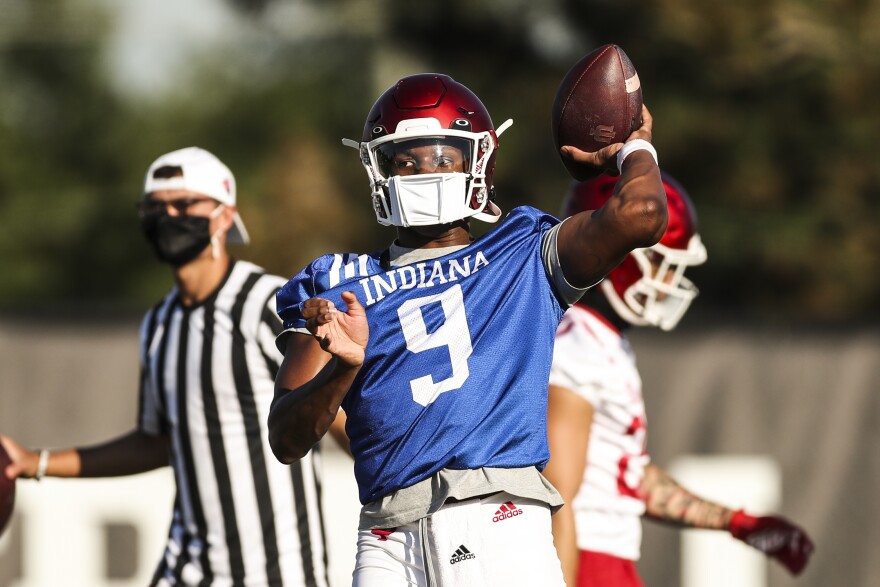 Indiana quarterback Michael Penix throws during an Aug. 6 practice outside Memorial Stadium.