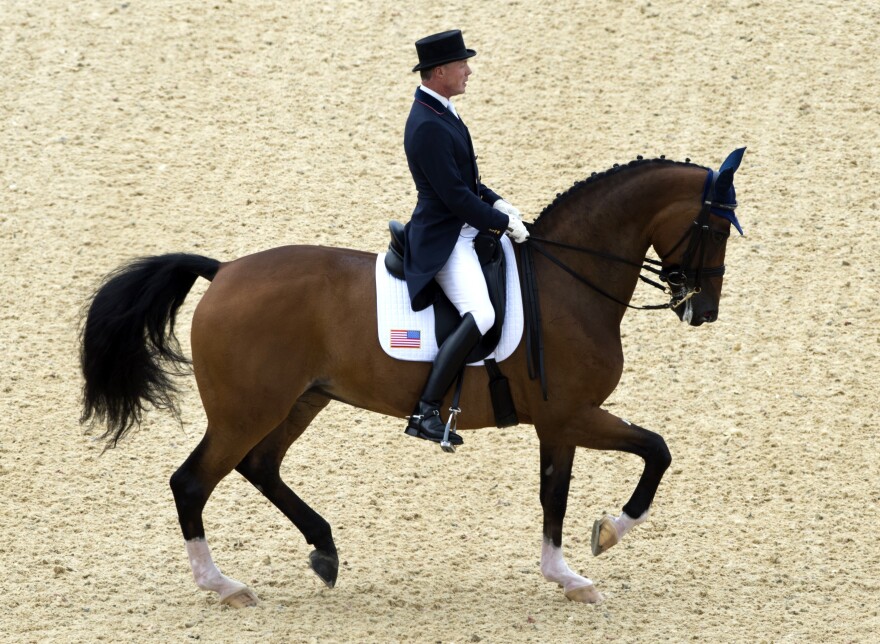 Jan Ebeling of the U.S. on Rafalca competes in the Dressage preliminaries of the London 2012 Olympic Games.