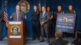 Florida CFO Jimmy Patronis, joined by Jacksonville Sheriff Mike Williams and Mayor Lenny Curry, anouncing the city's participating in Fraud Free Florida.