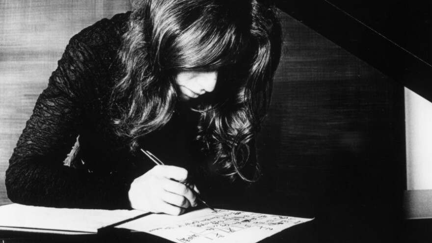 Carole King, composing.