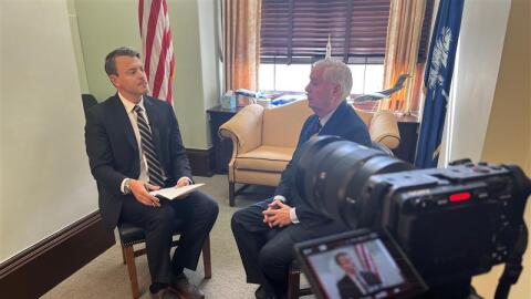Gavin Jackson talks with Sen. Lindsey Graham on Oct. 7, 2025, in Washington, D.C.