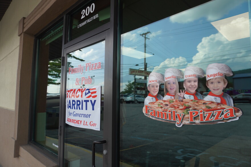 Family Pizza & Pub is a small restaurant in a shopping and dining plaza in Altoona. Several community members and Republican state leaders gathered inside the restaurant on Thursday to discuss Stacy Garrity's plan to address affordability if she is elected governor this fall. 