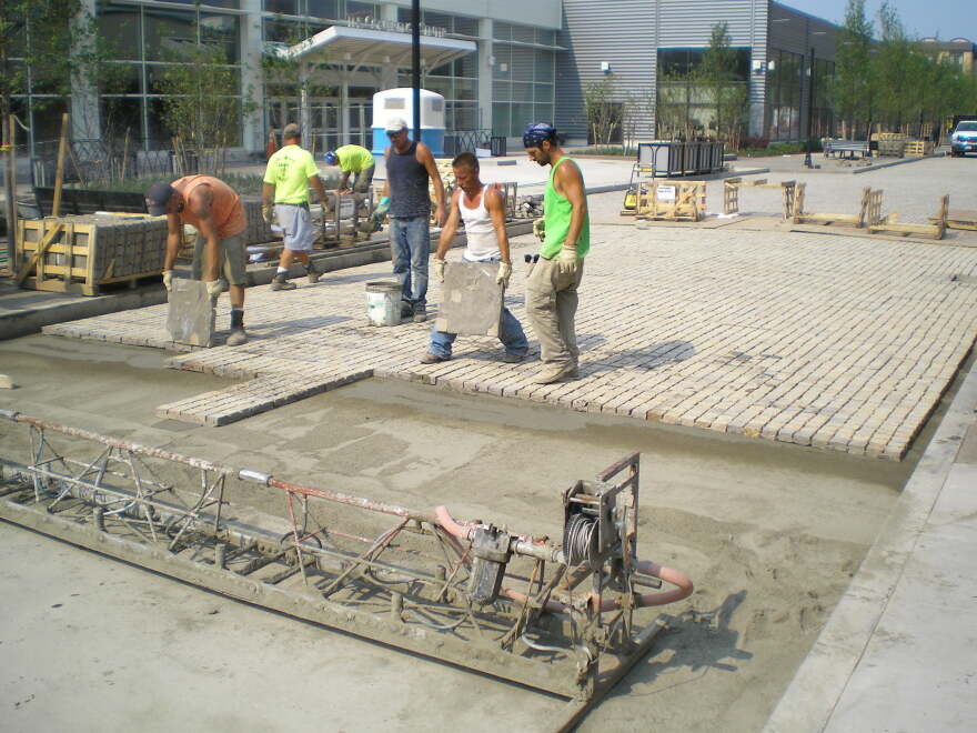 File photo of construction workers restopring Old Falls Street