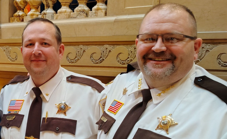 Itasca County Sheriff Joe Dasovich, left, and Cass County Sheriff Bryan Welk pose together at the Minnesota State Capitol in February 2025, while both were there to testify on behalf of public safety bills.