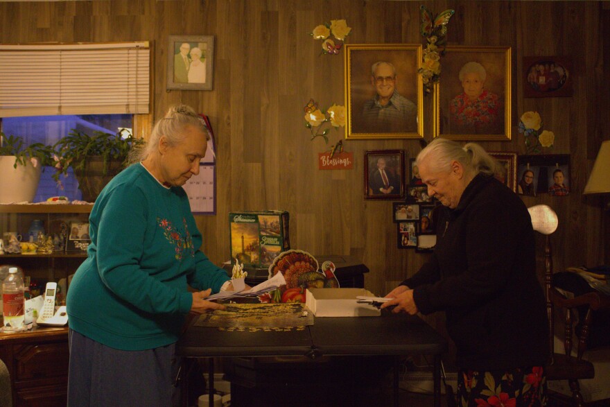 Theresa Woodworth, left, and her sister, Elaine Akerson, at Woodworth's home on Nov. 18, 2025. Woodworth and Akerson live at Loring, and are part of a group of residents and businesses challenging steep water rate and sewer rate increases.