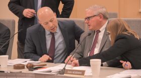 House Budget Chairman Cody Smith, left, and Senate Appropriations Chairman Dan Hegeman confer with legislative staff during a conference committee hearing on the state budget on May, 5, 2021.