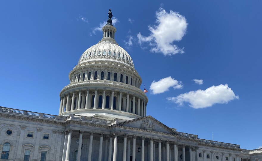 The United States Capitol building under a blue sky during the daytime in Washington, D.C.