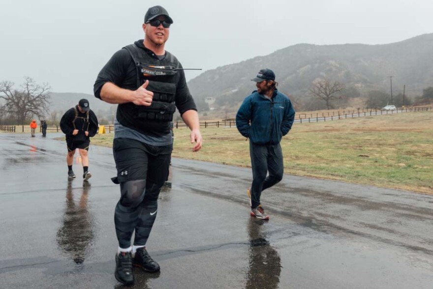 Sage Decker, an Army veteran with 16 years of experience fighting wildfires, leads a training session put on by Team Rubicon and the Bureau of Land Management.