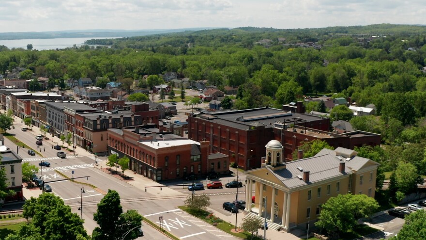 An aerial view of downtown shows the Labelon building just beyond Canandaigua City Hall. The imposing, boarded-up brick building at 10 Chapin St. has been vacant for decades. But developers want to renovate the structure into 52 apartments with first-floor commercial space. The city's targeted downtown revitalization district, awarded $10 million from the state, extends southward on either side of South Main St.
