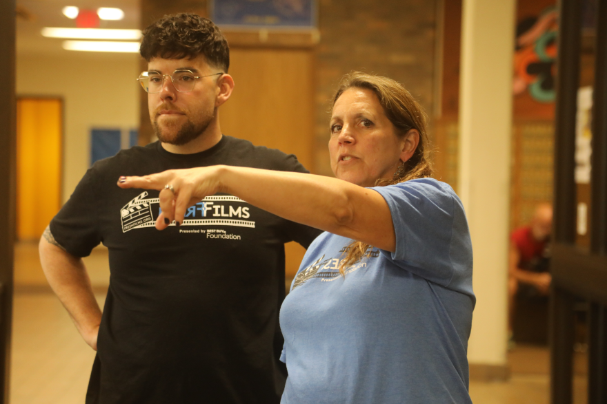 Kelli Feigley (right), managing director and co-CEO of Fresh Films, works with student intern Jeremiah McCarthy of the Boston area, in Rock Island.