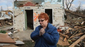 In Henryville, Ind., on Sunday, Janet Clark stood outside what remains of her home, which was destroyed in Friday's tornado.