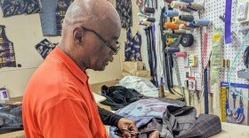 Hardy has been a tailor and Baltimore designer since the late 1970s, with a career that has taken him across the state. He now operates his Sew What’s Up design studio out of the Sew Bromo space, a restored historic garment building in Pigtown. Photo by Emily Hofstaedter/WYPR.