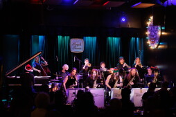 SWOJO (Seattle Women's Jazz Orchestra) with guest vocalist Jean Lenke, Jazzy Holiday Concert at The Royal Room. Piano: Lillian Wu; Saxophones L-R: Kathy Kronmal, Colleen Plunkett, Alex Worland, Jenny Zeifel, Ann Nordling; Trombones L-R: Aiyana Mehta, Susie Reese, Nicole Finkle, Hannah Reed; Trumpets L-R: Amanda Marquis, Marge Rosen, Robin Stangland, Debbie Meyer Snook; Bass: Rachel Contorer; Drums: Rob Parks;