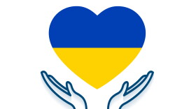 care hands with ukraine flag in heart shape