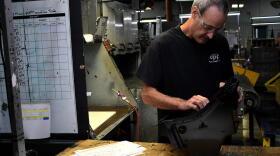 A worker at an Indiana plastic company.
