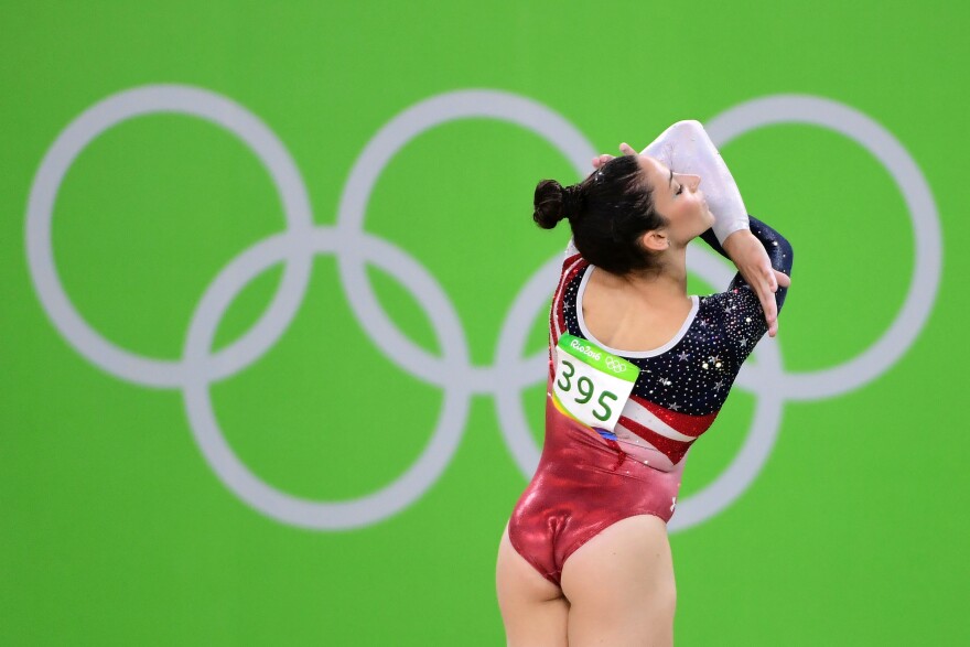 Aly Raisman of the United States competes in the floor event during the women's team final.