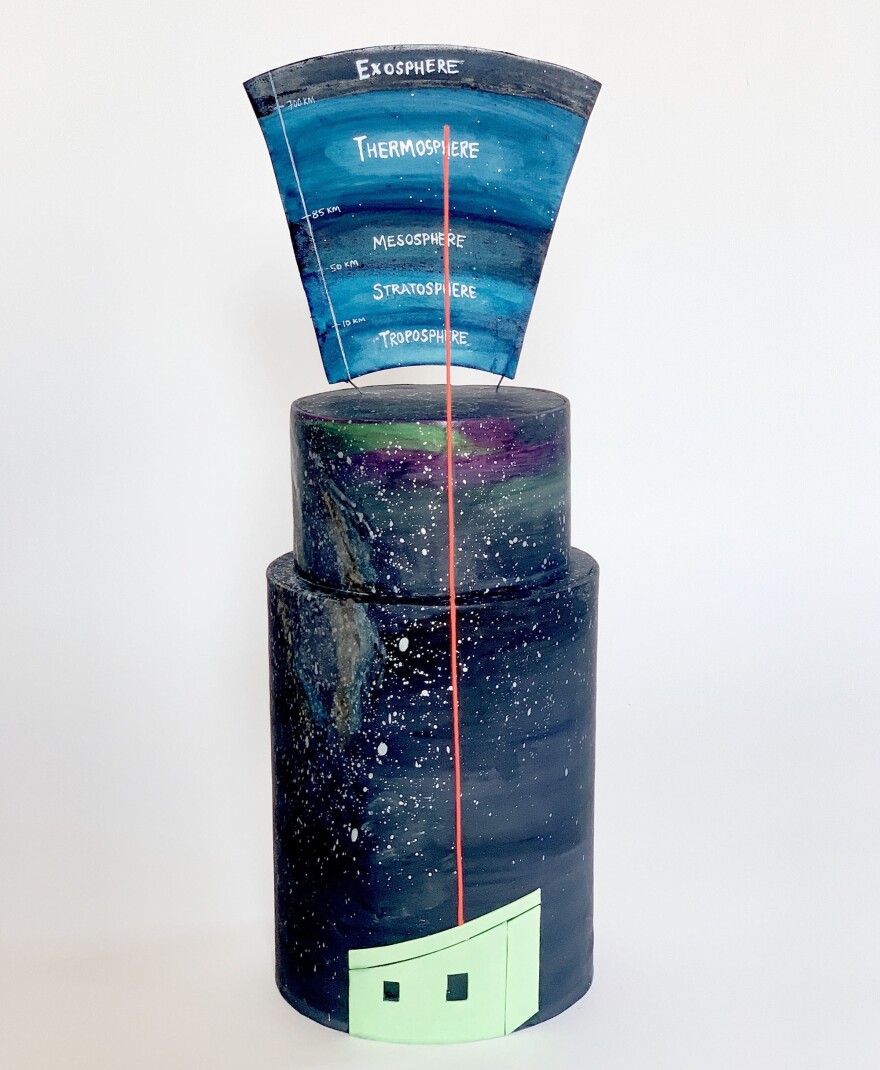 McAdoo says this cake is an homage to atmospheric scientists who have continuously operated equipment at Arrival Heights for more than 11 years — a full solar cycle. Their team shoots pulsed lasers into the sky to measure density, temperature and wind speed in the uppermost atmosphere, aided by the 24 hours of darkness during the Antarctic winter.