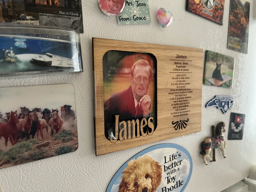 Jean Schoeny hangs a photo of her late husband Jim Schoeny on her fridge.