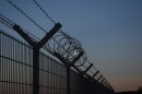  Fence outside a juvenile detention facility