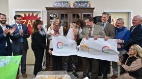 Volunteer Anthony Pauline cuts the ribbon at the Oct. 16, 2025, grand opening of the NEPA Youth Shelter's new teen center on Providence Road in Scranton.