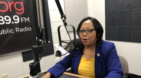 Peoria Mayor Rita Ali speaks into a microphone in the main studio at the WCBU Newsroom.