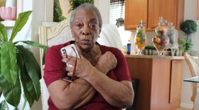 Rosemary McGill demonstrates how nonviolent civil rights protesters in Florida were told protect their bodies when assaulted by police.