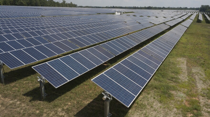 FILE - This Tuesday Aug. 6, 2019 file photo shows Dominion Energy's Scott Solar farm in Powhatan, Va.